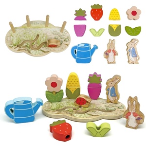 image:imageKids Preferred Peter Rabbit Garden Wooden Activity Stacker with 12 Wooden Interactive Pieces for Babies Toddlers and Kids Based on the Beatrix Potter Books